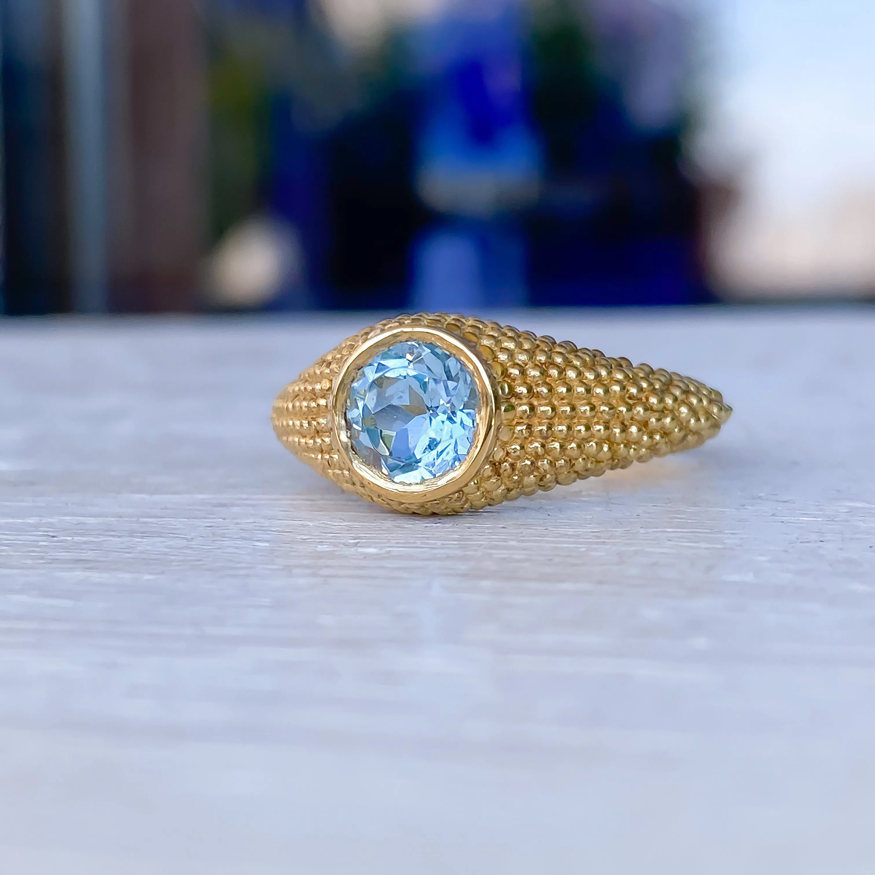 Nubia Round Blue Topaz Yellow Gold Ring Size 7.5US