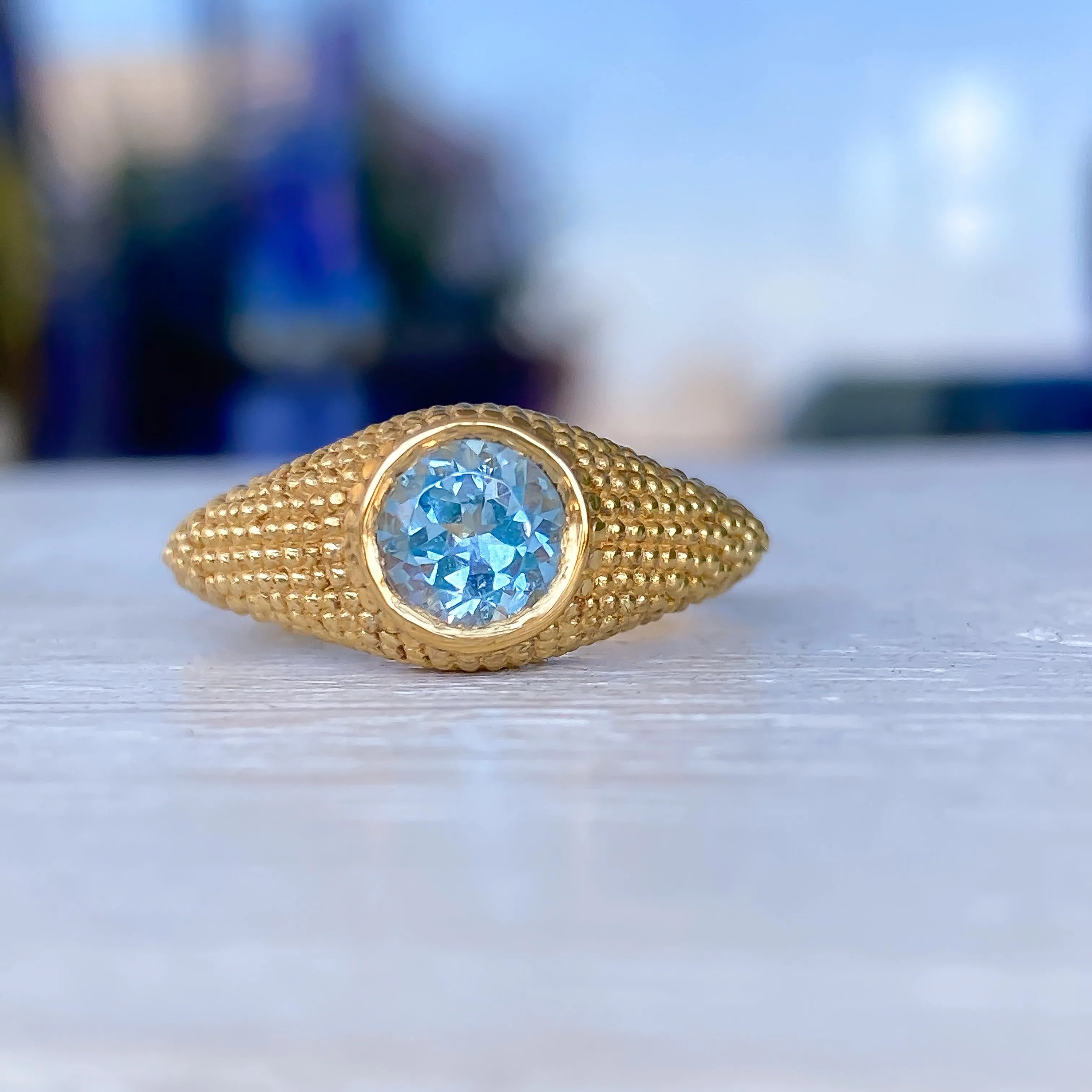 Nubia Round Blue Topaz Yellow Gold Ring Size 7.5US